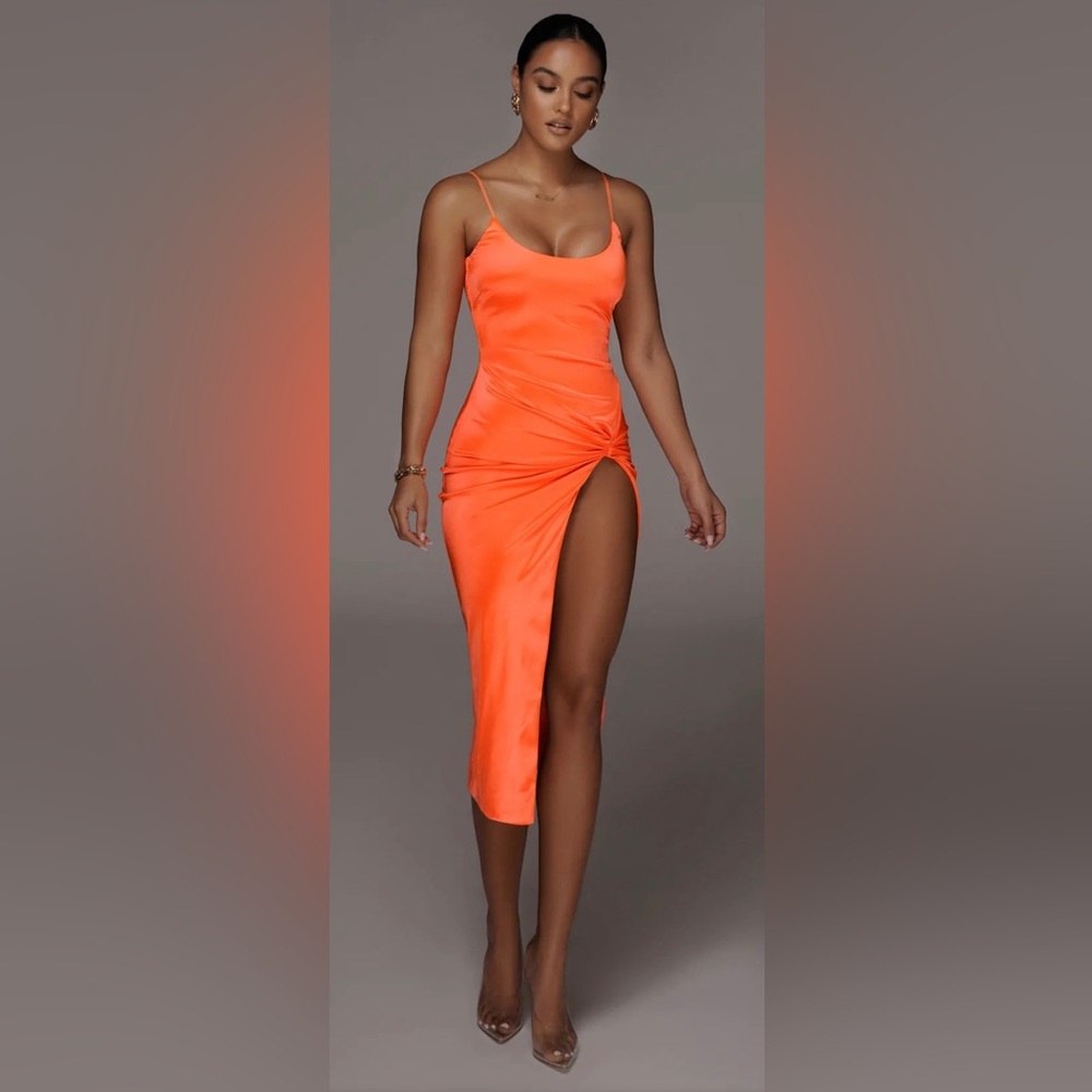 New with tags: JLuxLabel Orange high split dress. Size Medium.